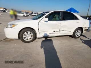 2003 Toyota Camry LE with VIN 4T1BE32K63U151394, listed as a Copart auction lot 84757455 with 202,520 mi miles and Salvage title. Bid and sale history available at DreamBid. Image 1.