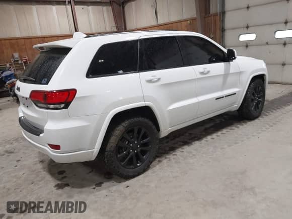 2020 Jeep Grand Cherokee Altitude with VIN 1C4RJFAG5LC138445, listed as a IAAI auction lot 42301218 with 72,430 mi miles and . Bid and sale history available at DreamBid. Image 4.