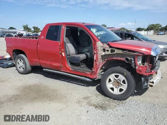 2017 Toyota Tundra SR5 with VIN 5TFRY5F19HX227557, listed as a Copart auction lot 82002155 with 127,544 mi miles and Salvage title. Bid and sale history available at DreamBid. Image 4.
