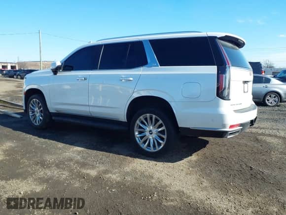 2021 Cadillac Escalade Premium Luxury with VIN 1GYS4BKLXMR394649, listed as a IAAI auction lot 41474731 with 85,268 mi miles and . Bid and sale history available at DreamBid. Image 3.