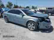 2009 Saturn Aura XE with VIN 1G8ZS57B49F222261, listed as a Copart auction lot 53421445 with 105,615 mi miles and Salvage title. Bid and sale history available at DreamBid. Image 4.