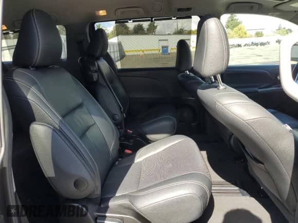 2015 Toyota Sienna SE with VIN 5TDXK3DC6FS622851, listed as a Copart auction lot 82207425 with 112,162 mi miles and Salvage title. Bid and sale history available at DreamBid. Image 11.