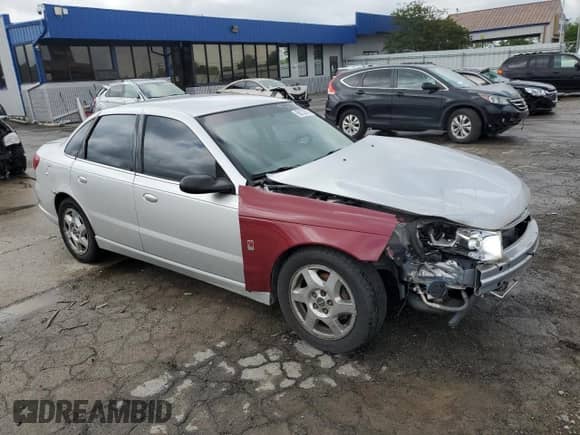 2004 Saturn L with VIN 1G8JL54R74Y512793, listed as a Copart auction lot 58732765 with 271,776 mi miles and Salvage title. Bid and sale history available at DreamBid. Image 4.