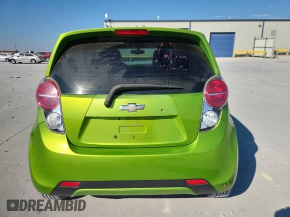 2014 Chevrolet Spark LS with VIN KL8CB6S94EC565436, listed as a Copart auction lot 86057295 with 106,927 mi miles and Salvage title. Bid and sale history available at DreamBid. Image 6.