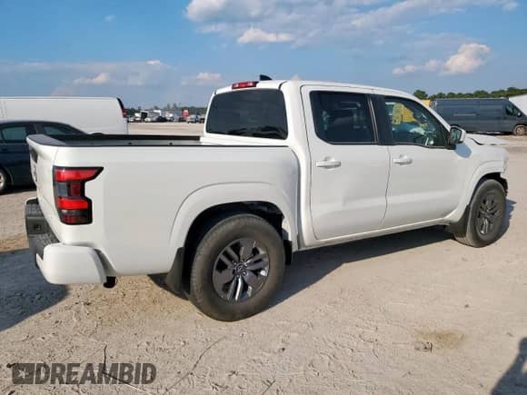 2025 Nissan Frontier Pro-X with VIN 1N6ED1EJ9SN607017, listed as a Copart auction lot 85093005 with 50 mi miles and Salvage title. Bid and sale history available at DreamBid. Image 3.