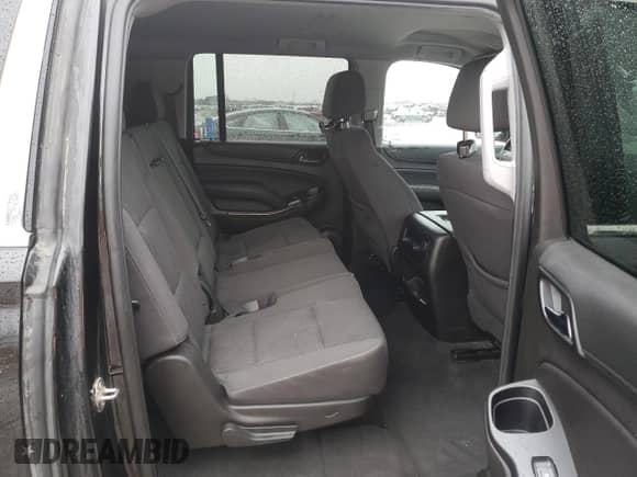 2019 Chevrolet Suburban LS с VIN 1GNSKGKC6KR121947, выставлен на аукционе Copart как лот 87117324 с пробегом 127 556 миль миль и На запчасти • Non repairable. История ставок и продаж доступна на DreamBid. Изображение 11.