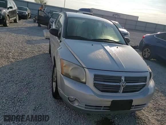 2011 Dodge Caliber Mainstreet with VIN 1B3CB3HA6BD225509, listed as a Copart auction lot 81013405 with 131,269 mi miles and Salvage title. Bid and sale history available at DreamBid. Image 15.