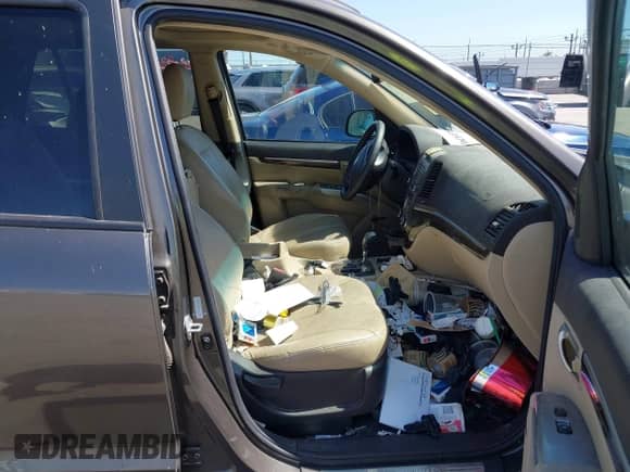 2012 Hyundai Santa Fe Limited with VIN 5XYZK4AG3CG126162, listed as a IAAI auction lot 42526570 with 878,070 mi miles and . Bid and sale history available at DreamBid. Image 5.