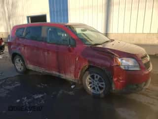 2012 Chevrolet Orlando 1LT with VIN KL77P2EM9CK580954, listed as a Copart auction lot 83370534 with 214,895 mi miles and Salvage title. Bid and sale history available at DreamBid. Image 4.