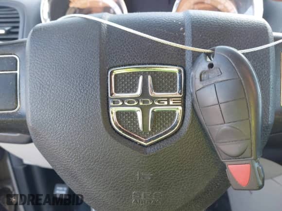 2013 Dodge Grand Caravan SXT z VIN 2C4RDGCG9DR749646, wystawiony jako IAAI lot #43433367 z przebiegiem 187 451 mil mil oraz . Historia ofert i sprzedaży dostępna na DreamBid. Obrazek 11.