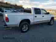 2003 Dodge Dakota с VIN 1D7HG48Z53S314833, выставлен на аукционе Copart как лот 79142254 с пробегом 131 044 миль миль и Списание • Salvage title. История ставок и продаж доступна на DreamBid. Изображение 3.