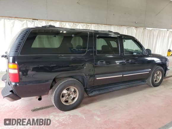 2001 Chevrolet Suburban LT z VIN 3GNFK16T21G242868, wystawiony jako Copart lot #73703894 z przebiegiem 359 694 mil mil oraz Szkoda całkowita • Salvage title. Historia ofert i sprzedaży dostępna na DreamBid. Obrazek 3.