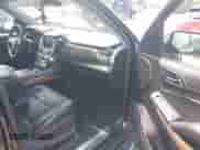 2018 Chevrolet Tahoe Premier with VIN 1GNSKCKC8JR104865, listed as a IAAI auction lot 42771057 with 123,387 mi miles and . Bid and sale history available at DreamBid. Image 5.