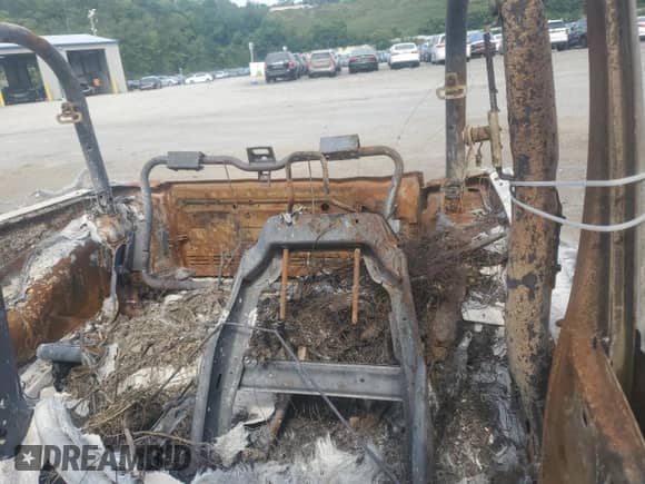 2014 Jeep Wrangler Sahara z VIN 1C4AJWBG6EL168763, wystawiony jako Copart lot #65880875 z przebiegiem Nie podano mil oraz Szkoda całkowita • Salvage title. Historia ofert i sprzedaży dostępna na DreamBid. Obrazek 10.