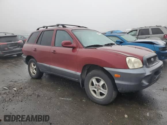 2002 Hyundai Santa Fe GLS с VIN KM8SC73D02U163780, выставлен на аукционе Copart как лот 84188554 с пробегом 115 638 миль миль и Чистый • Clean title. История ставок и продаж доступна на DreamBid. Изображение 4.