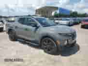 2023 Hyundai Santa Cruz Night Edition с VIN 5NTJCDAF6PH063978, выставлен на аукционе Copart как лот 66947895 с пробегом 39 086 миль миль и Списание • Salvage title. История ставок и продаж доступна на DreamBid. Изображение 4.