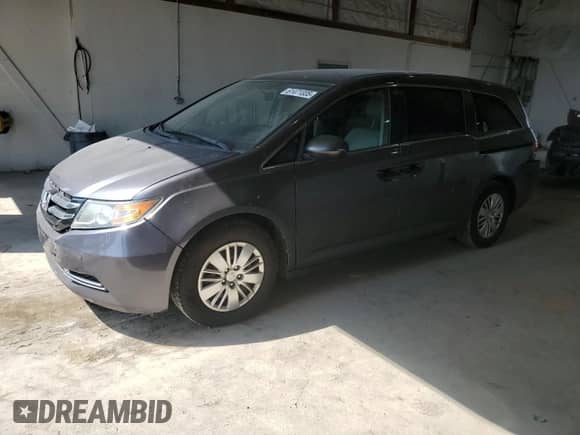 2015 Honda Odyssey LX with VIN 5FNRL5H24FB115955, listed as a Copart auction lot 61471335 with 114,741 mi miles and Salvage title. Bid and sale history available at DreamBid. Image 1.