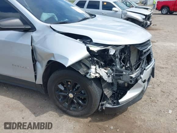 2020 Chevrolet Equinox LS z VIN 2GNAXSEVXL6122948, wystawiony jako IAAI lot #42495010 z przebiegiem 67 429 mil mil oraz . Historia ofert i sprzedaży dostępna na DreamBid. Obrazek 6.