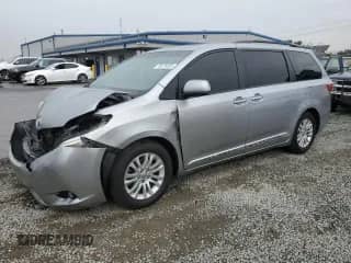 2015 Toyota Sienna XLE with VIN 5TDYK3DC0FS584442, listed as a Copart auction lot 70875035 with 183,330 mi miles and Salvage title. Bid and sale history available at DreamBid. Image 1.