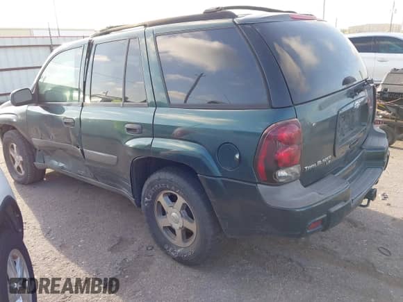 2005 Chevrolet TrailBlazer LS with VIN 1GNDS13S552124587, listed as a IAAI auction lot 43290539 with 163,135 mi miles and . Bid and sale history available at DreamBid. Image 3.