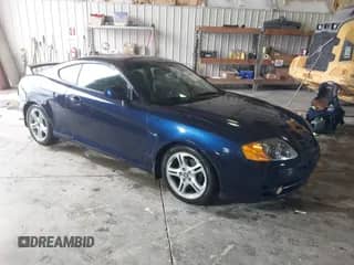 2004 Hyundai Tiburon GT с VIN KMHHN65F64U142304, выставлен на аукционе IAAI как лот 42420996 с пробегом 119 067 миль миль и . История ставок и продаж доступна на DreamBid. Изображение 1.