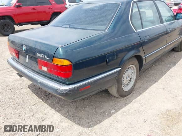 1994 BMW 7 Series with VIN WBAGD8329RDE92628, listed as a IAAI auction lot 42177332 with 176,179 mi miles and . Bid and sale history available at DreamBid. Image 6.