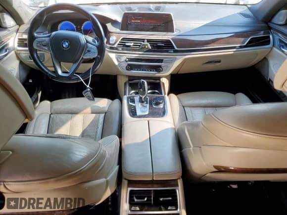 2017 BMW 7 Series 750i с VIN WBA7F0C55HGM21314, выставлен на аукционе Copart как лот 69801685 с пробегом 142 007 миль миль и Чистый • Clean title. История ставок и продаж доступна на DreamBid. Изображение 8.