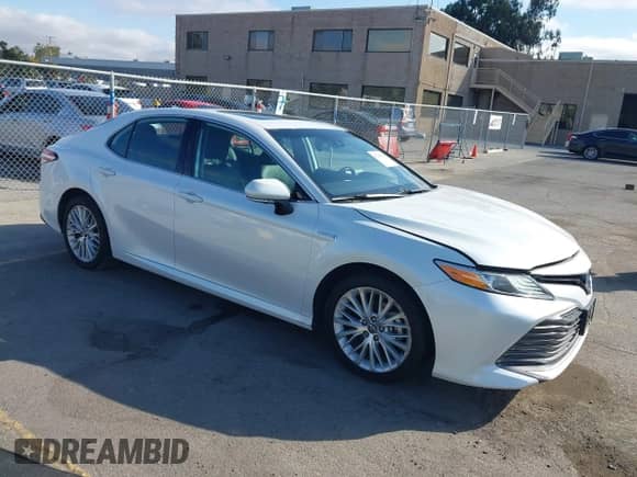 2020 Toyota Camry Hybrid XLE with VIN 4T1F31AK4LU523702, listed as a IAAI auction lot 42734831 with 144,778 mi miles and . Bid and sale history available at DreamBid. Image 1.