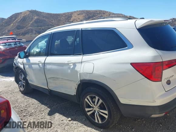 2016 Honda Pilot EX-L z VIN 5FNYF6H7XGB043603, wystawiony jako IAAI lot #43344995 z przebiegiem 211 226 mil mil oraz . Historia ofert i sprzedaży dostępna na DreamBid. Obrazek 14.