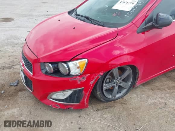 2016 Chevrolet Sonic RS z VIN 1G1JG6SB1G4158098, wystawiony jako IAAI lot #42075726 z przebiegiem 114 045 mil mil oraz . Historia ofert i sprzedaży dostępna na DreamBid. Obrazek 12.