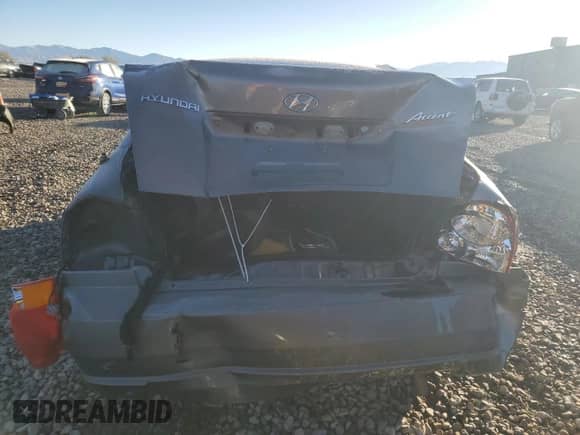 2005 Hyundai Accent GLS с VIN KMHCG45C95U592609, выставлен на аукционе Copart как лот 79048224 с пробегом 138 738 миль миль и Списание • Salvage title. История ставок и продаж доступна на DreamBid. Изображение 6.