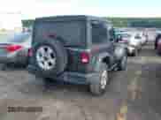 2020 Jeep Wrangler Sport S with VIN 1C4GJXAG9LW303604, listed as a IAAI auction lot 42221305 with 71,189 mi miles and . Bid and sale history available at DreamBid. Image 4.