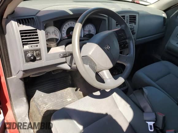2005 Dodge Dakota SLT с VIN 1D7HE42N75S149298, выставлен на аукционе Copart как лот 57951265 с пробегом 171 884 миль миль и Списание • Salvage title. История ставок и продаж доступна на DreamBid. Изображение 8.