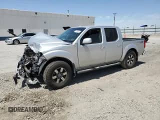 2010 Nissan Frontier Pro-4X with VIN 1N6AD0EV9AC414002, listed as a Copart auction lot 61584065 with Not provided miles and Salvage title. Bid and sale history available at DreamBid. Image 1.