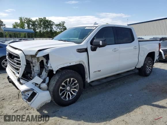 2019 GMC Sierra 1500 AT4 with VIN 3GTP9EED0KG102605, listed as a Copart auction lot 57444625 with 148,559 mi miles and Salvage title. Bid and sale history available at DreamBid. Image 1.