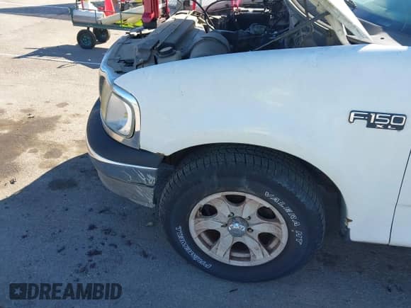 2002 Ford F-150 XL с VIN 1FTRF17212NA27698, выставлен на аукционе IAAI как лот 43449350 с пробегом 290 416 миль миль и . История ставок и продаж доступна на DreamBid. Изображение 12.