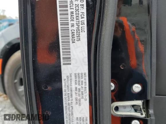 2023 Dodge Charger Police z VIN 2C3CDXAT5PH522975, wystawiony jako Copart lot #50152225 z przebiegiem Nie podano mil oraz Szkoda całkowita • Salvage title. Historia ofert i sprzedaży dostępna na DreamBid. Obrazek 12.