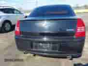 2006 Chrysler 300 C SRT-8 with VIN 2C3LA73W86H388896, listed as a IAAI auction lot 40599030 with 152,547 mi miles and . Bid and sale history available at DreamBid. Image 16.