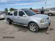 2002 Nissan Frontier SE с VIN 1N6ED29X22C356308, выставлен на аукционе Copart как лот 66738245 с пробегом 232 178 миль миль и Списание • Salvage title. История ставок и продаж доступна на DreamBid. Изображение 4.