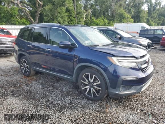 2021 Honda Pilot Touring 8-Passenger z VIN 5FNYF5H97MB008444, wystawiony jako Copart lot #63757265 z przebiegiem 37 905 mil mil oraz Szkoda całkowita • Salvage title. Historia ofert i sprzedaży dostępna na DreamBid. Obrazek 4.
