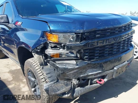 2021 Chevrolet Silverado 1500 Custom Trail Boss with VIN 1GCPYCEF4MZ234391, listed as a IAAI auction lot 42677448 with 87,228 mi miles and . Bid and sale history available at DreamBid. Image 6.