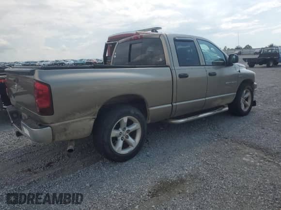 2007 Dodge 1500 SLT with VIN 1D7HA18217J615906, listed as a Copart auction lot 69108075 with 178,914 mi miles and Salvage title. Bid and sale history available at DreamBid. Image 3.