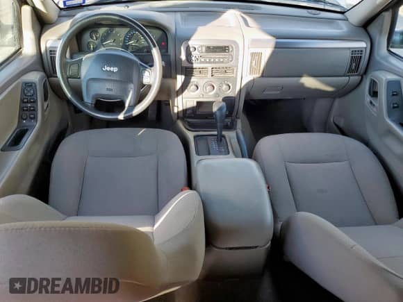 2004 Jeep Grand Cherokee Laredo with VIN 1J4GX48S94C313442, listed as a Copart auction lot 86679925 with 52,727 mi miles and Salvage title. Bid and sale history available at DreamBid. Image 8.