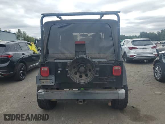 2003 Jeep Wrangler Rubicon с VIN 1J4FA69S93P334595, выставлен на аукционе Copart как лот 68247145 с пробегом 127 361 миль миль и Списание • Salvage title. История ставок и продаж доступна на DreamBid. Изображение 6.