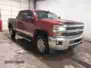 2015 Chevrolet Silverado 2500HD LT z VIN 1GC1KVE87FF113492, wystawiony jako IAAI lot #41556754 z przebiegiem 200 870 mil mil oraz . Historia ofert i sprzedaży dostępna na DreamBid. Obrazek 1.