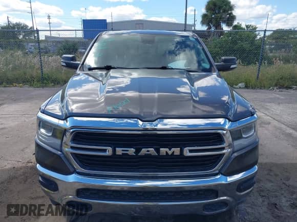 2020 Ram 1500 Lone Star with VIN 1C6SRFFT0LN155861, listed as a IAAI auction lot 43398075 with 130,433 mi miles and . Bid and sale history available at DreamBid. Image 6.