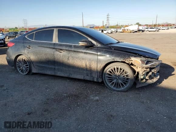 2018 Hyundai Elantra Sport с VIN KMHD04LBXJU599436, выставлен на аукционе Copart как лот 81773845 с пробегом 125 354 миль миль и Списание • Salvage title. История ставок и продаж доступна на DreamBid. Изображение 4.