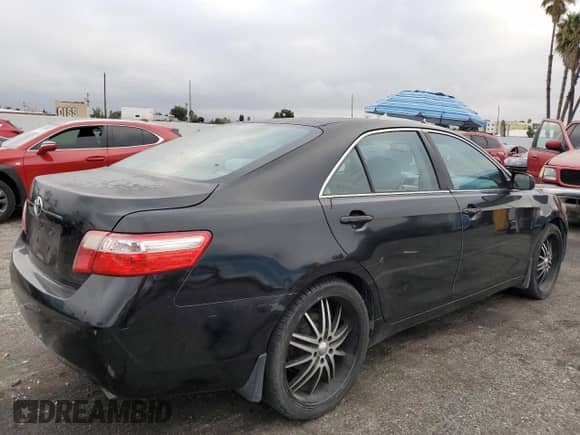 2009 Toyota Camry XLE with VIN 4T4BE46K39R064695, listed as a Copart auction lot 83857625 with 214,030 mi miles and Salvage title. Bid and sale history available at DreamBid. Image 3.