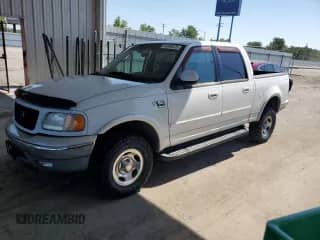 2002 Ford F-150 XLT with VIN 1FTRW08622KE36581, listed as a Copart auction lot 63496475 with Not provided miles and Salvage title. Bid and sale history available at DreamBid. Image 1.