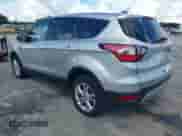 2017 Ford Escape SE with VIN 1FMCU9GD3HUC16133, listed as a IAAI auction lot 43426604 with 126,435 mi miles and . Bid and sale history available at DreamBid. Image 3.